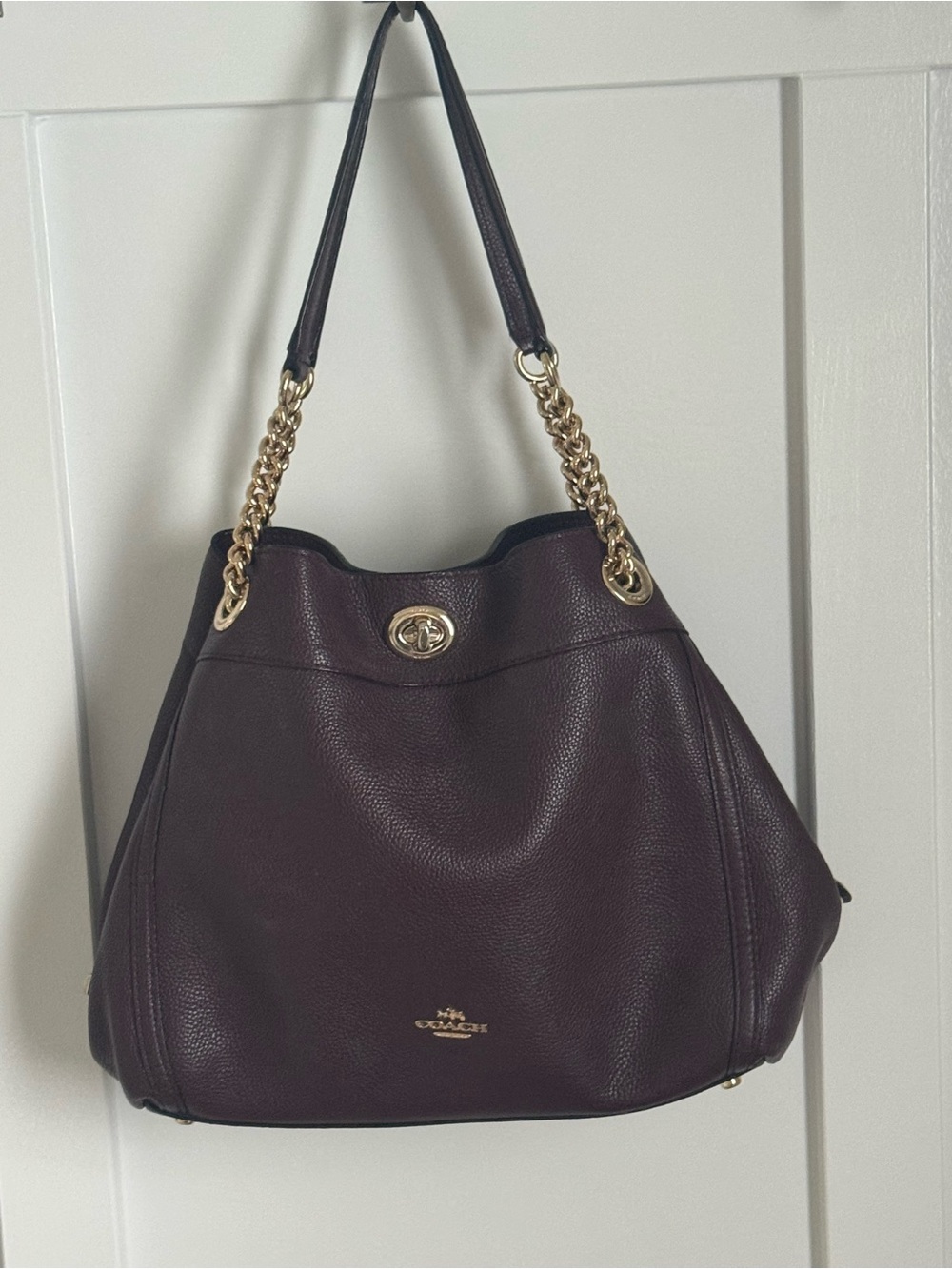 Coach brand Pebbled Leather Shoulder Bag in burgundy with Gold Hardware